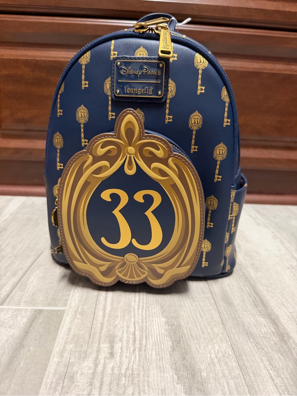 Loungefly Navy and Gold '33' Mini Backpack